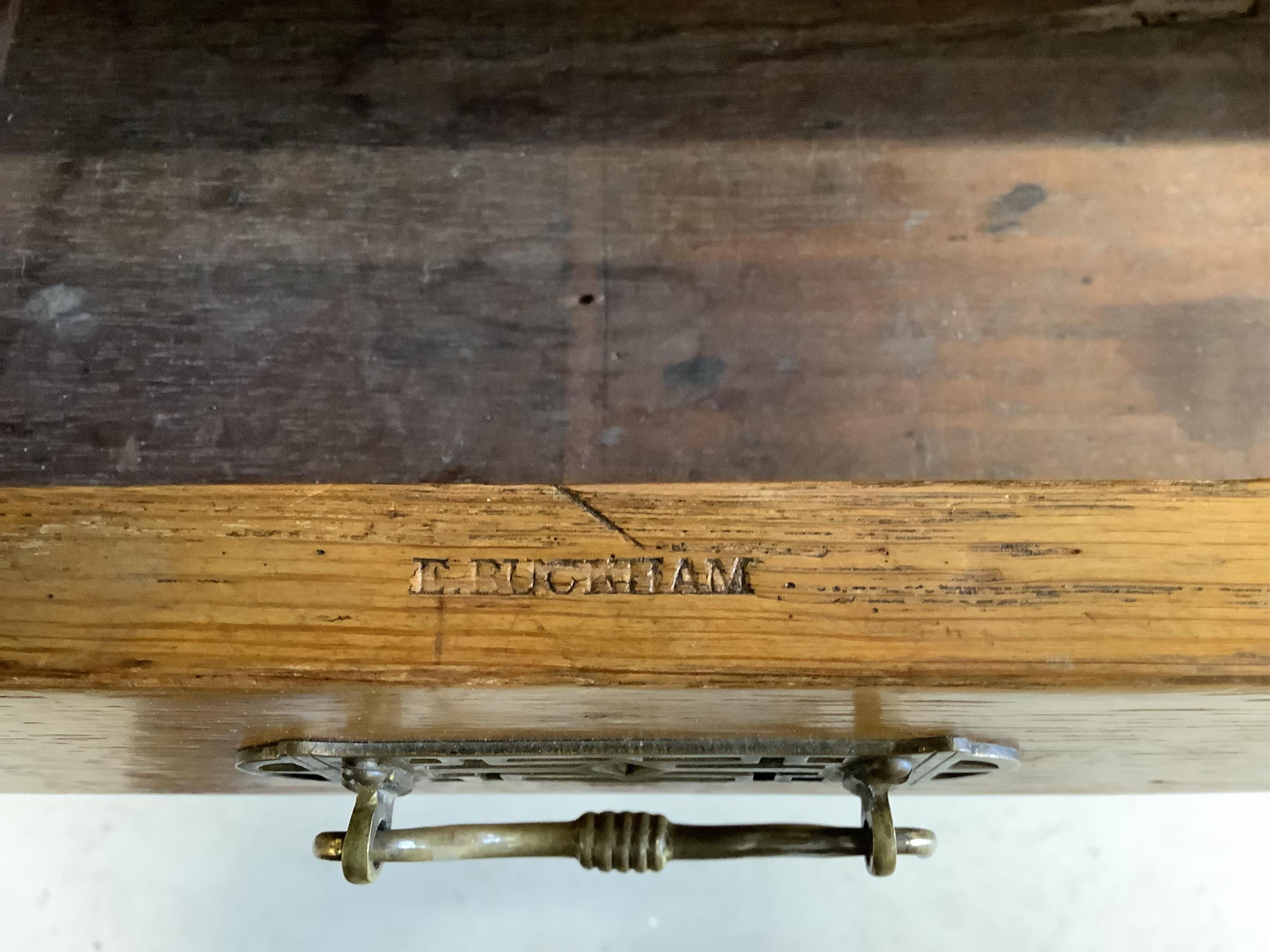 A Victorian golden oak pedestal desk, stamped E Buckham, width 136cm, depth 74cm, height 76cm. Condition - fair to good